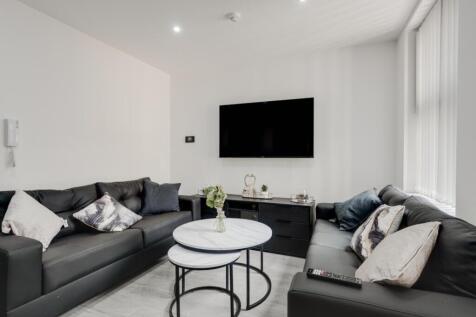 A stylish and inviting large modern living room...