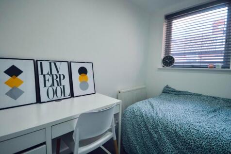A stylish and inviting double bedroom with a co...