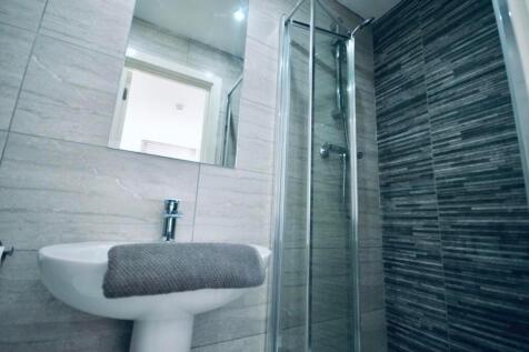 A modern and clean bathroom featuring a sleek s...
