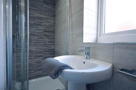 A modern and well-maintained bathroom featuring...