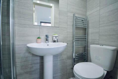 A modern and clean bathroom featuring stylish f...