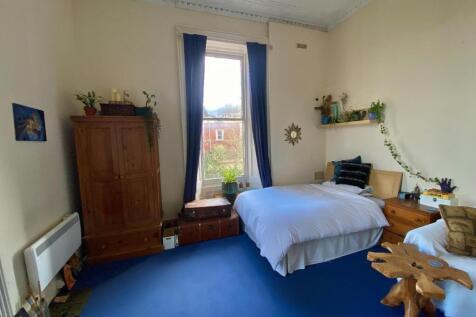 Bright and inviting double bedroom featuring a ...