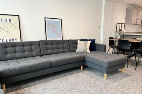 A stylish and inviting living room featuring a ...