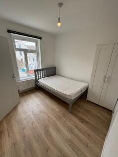 Bright and inviting double bedroom featuring a ...