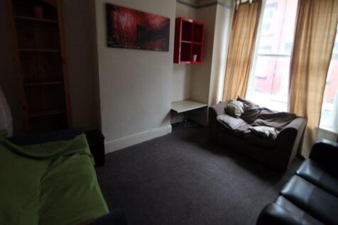 Cozy living room with a large window allowing n...