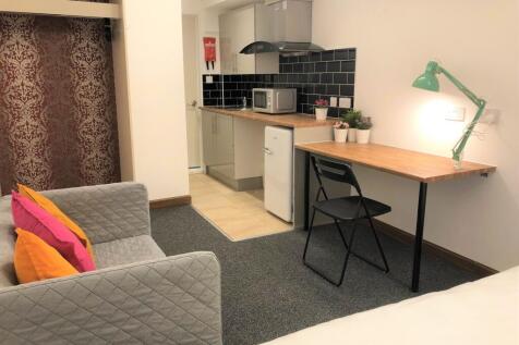 A well-maintained, modern living space featurin...