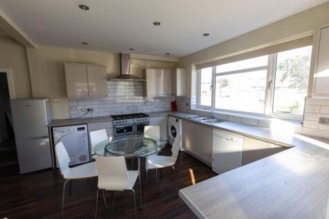 Bright and modern kitchen with large window pro...