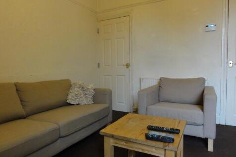 A cozy living room featuring two comfortable so...