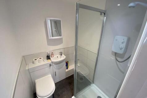 A clean and well-maintained bathroom featuring ...