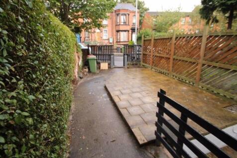 The image shows the front exterior of a residen...