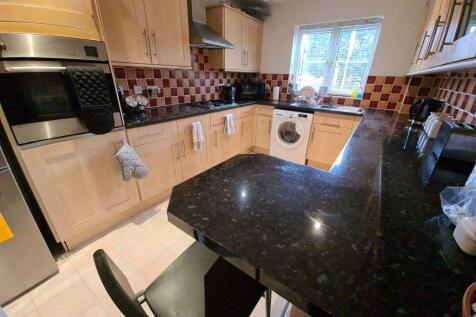 A bright and well-maintained kitchen featuring ...