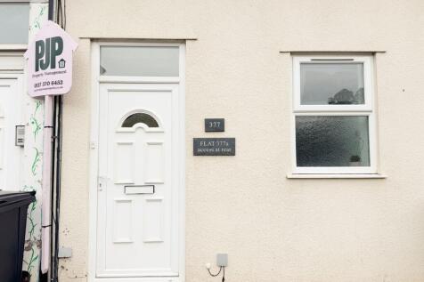 Well-maintained property frontage with a clean ...