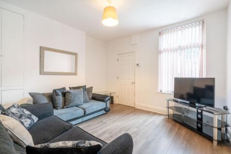 Bright and welcoming living room featuring two ...