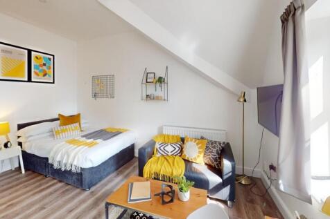 A spacious and inviting large double bedroom, b...