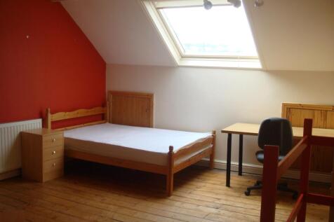 Bright and inviting double bedroom with natural...