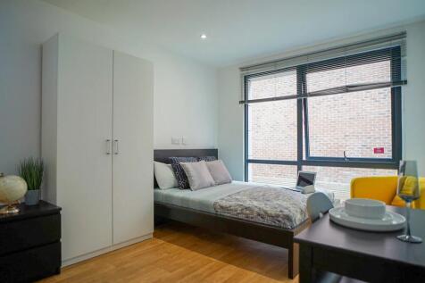 Bright, modern double bedroom with large window...