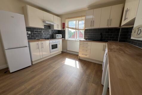 Modern, well-maintained kitchen featuring ample...