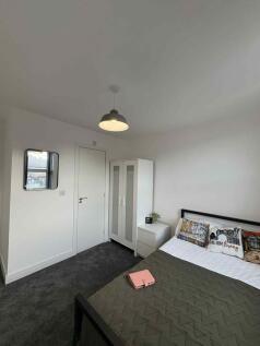 Bright, clean double bedroom with neutral decor...