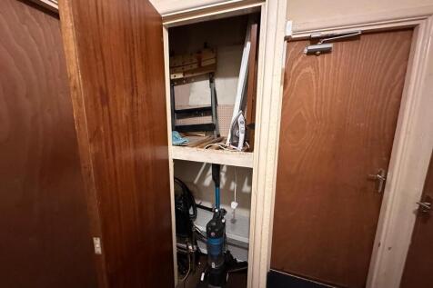 Compact hallway storage cupboard with built-in ...