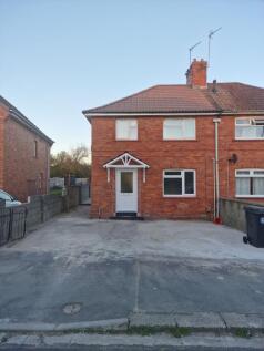 Well-maintained red-brick semi-detached house w...