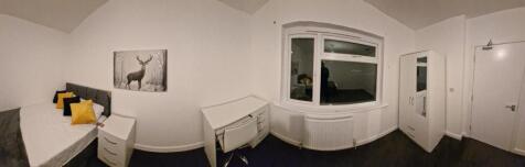 Bright, freshly decorated double bedroom with a...