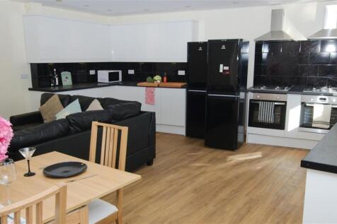 Bright open-plan living and kitchen with modern...