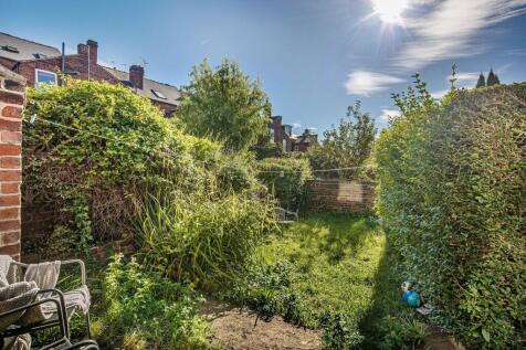 Sunny private rear garden with mature hedging, ...