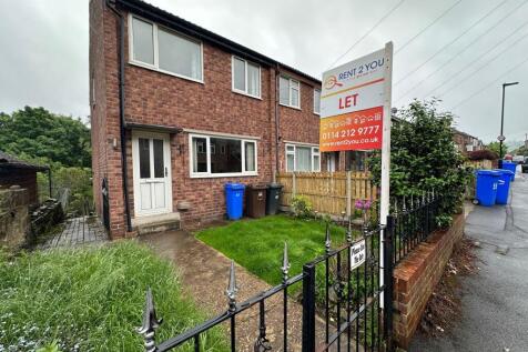Brick-fronted semi with a small fenced front ga...