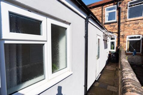 Sunlit side access with fresh white exterior, s...