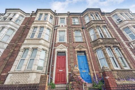 Attractive terraced house exterior with decorat...