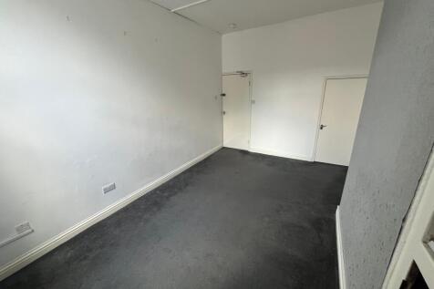 A clean and well-maintained hallway featuring n...