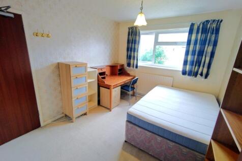 Bright, neatly presented bedroom with a double ...