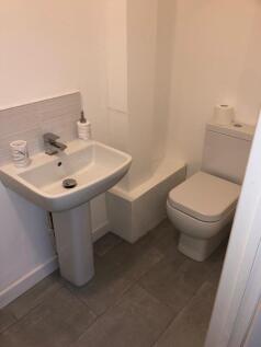 Fresh, modern bathroom with a contemporary pede...