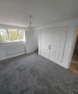 Bright, freshly redecorated bedroom with new fi...