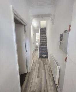 Bright, recently updated hallway with modern wo...