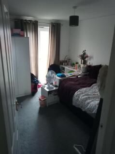 Cozy single bedroom with a comfortable bed, bed...