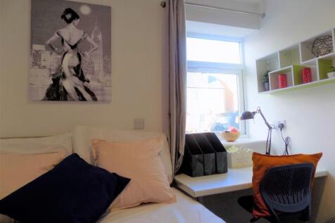 Well-presented bedroom with a comfortable bed, ...