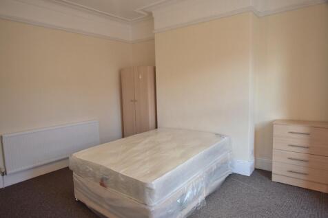 Bright and inviting double bedroom featuring a ...