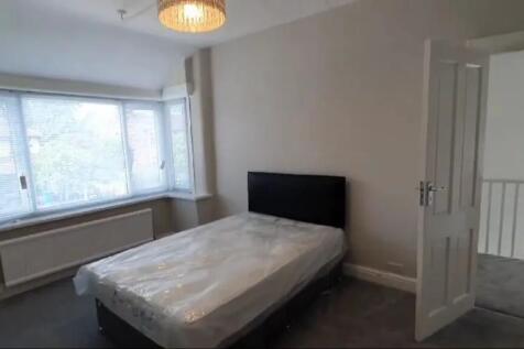 Bright and inviting double bedroom featuring am...