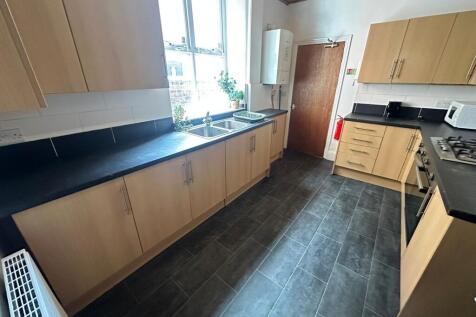 Bright and inviting kitchen with ample natural ...