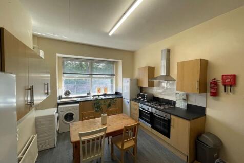 Bright and functional kitchen featuring a large...