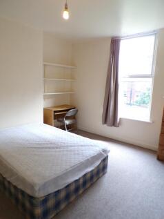 A spacious double bedroom featuring good natura...
