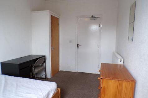 Simple furnished single bedroom with a single b...