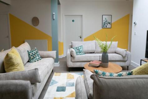 A spacious and stylish modern living room, perf...