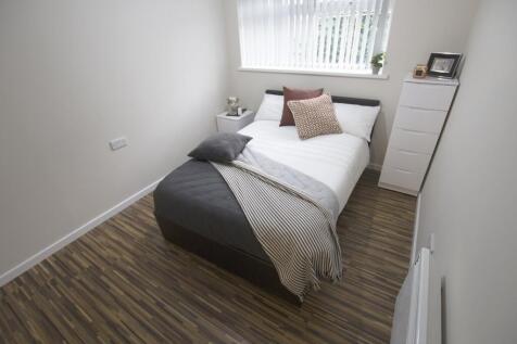 A bright and inviting double bedroom, perfect f...