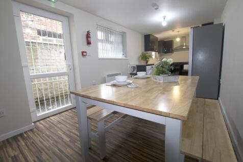 A bright and inviting kitchenette with a modern...