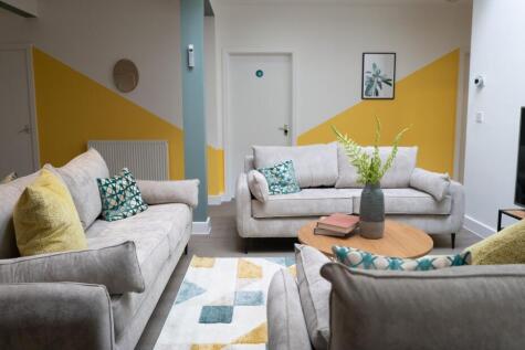 A bright and spacious modern living room, perfe...