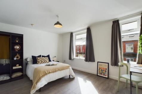 A beautifully designed double bedroom featuring...