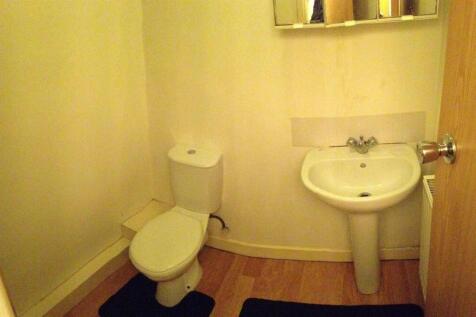 A clean and well-maintained bathroom featuring ...