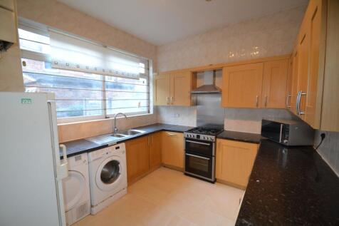 Bright and functional kitchen with ample natura...